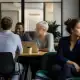 Diverse group of professionals in a business meeting at Townsend Strategies.