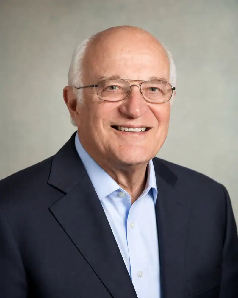 Professional Portrait of Elderly Businessman Elderly businessman in a suit smiling for a professional portrait.